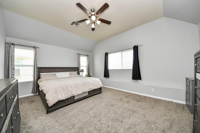 15543 Sheldon Ridge Way, Houston, TX 77044 - bedroom featuring lofted ceiling, baseboards, carpet floors, and a ceiling fan