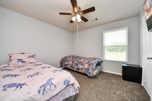 15543 Sheldon Ridge Way, Houston, TX 77044 - carpeted bedroom with ceiling fan and baseboards