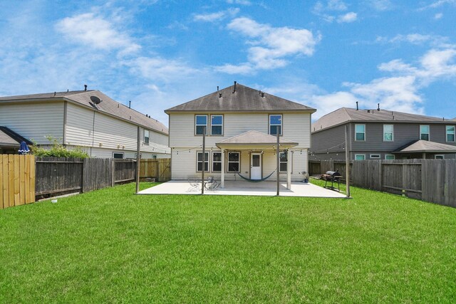 15543 Sheldon Ridge Way, Houston, TX 77044 - rear view of house featuring a patio