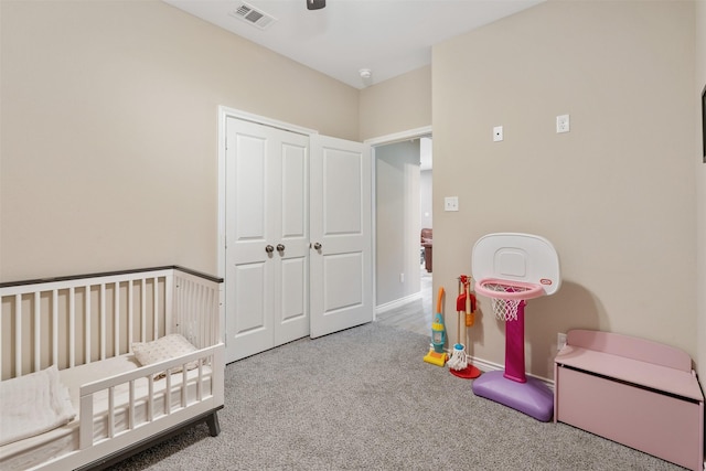 237 Ridgeside Ct, Montgomery, TX 77316 - bedroom featuring a nursery area, carpet flooring, a closet, and ceiling fan