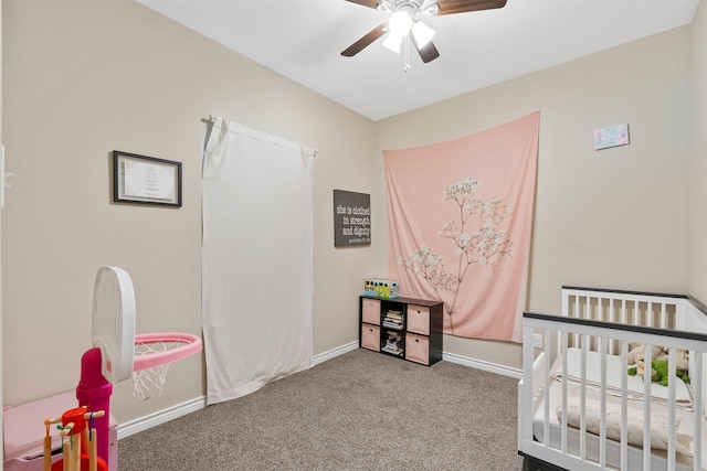 237 Ridgeside Ct, Montgomery, TX 77316 - carpeted bedroom with a crib, baseboards, and ceiling fan