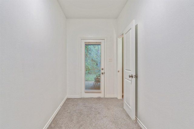 237 Ridgeside Ct, Montgomery, TX 77316 - hallway featuring light colored carpet and baseboards