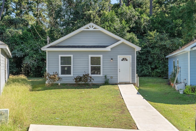 237 Ridgeside Ct, Montgomery, TX 77316 - bungalow featuring a front yard