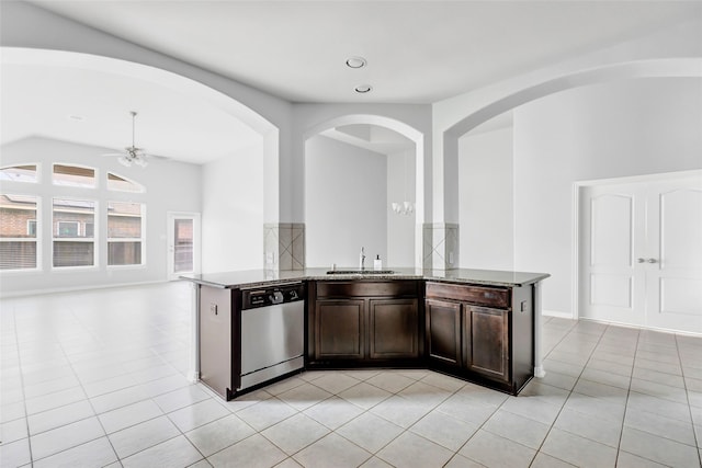 30510 Legend Oaks Ct, Magnolia, TX 77355 - kitchen with dishwasher, a sink, stone counters, ceiling fan, and open floor plan