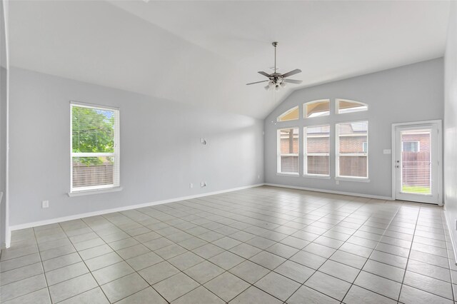 30510 Legend Oaks Ct, Magnolia, TX 77355 - unfurnished room with ceiling fan, vaulted ceiling, light tile patterned floors, and baseboards
