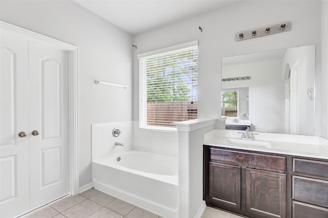 30510 Legend Oaks Ct, Magnolia, TX 77355 - full bathroom with a bath, tile patterned flooring, vanity, and baseboards