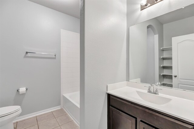 30510 Legend Oaks Ct, Magnolia, TX 77355 - bathroom featuring tile patterned flooring, vanity, toilet, and baseboards
