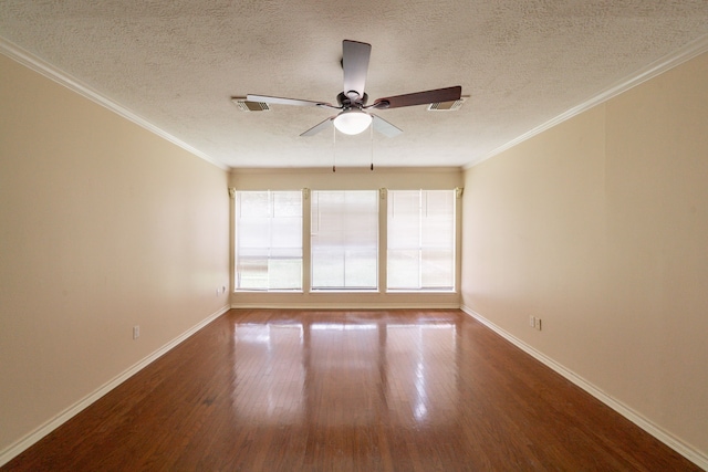 6914 Coral Ridge Rd, Houston, TX 77069 - spare room featuring wood finished floors, ceiling fan, baseboards, a textured ceiling, and ornamental molding