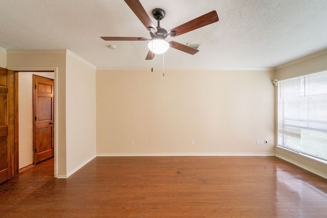 6914 Coral Ridge Rd, Houston, TX 77069 - spare room featuring wood finished floors, a ceiling fan, a textured ceiling, ornamental molding, and baseboards