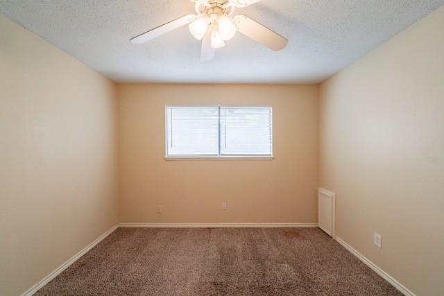 6914 Coral Ridge Rd, Houston, TX 77069 - unfurnished room featuring carpet, ceiling fan, a textured ceiling, and baseboards