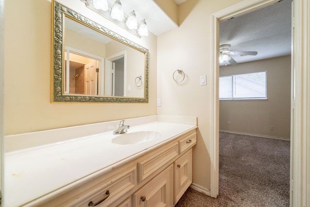 6914 Coral Ridge Rd, Houston, TX 77069 - bathroom with vanity, ceiling fan, and baseboards