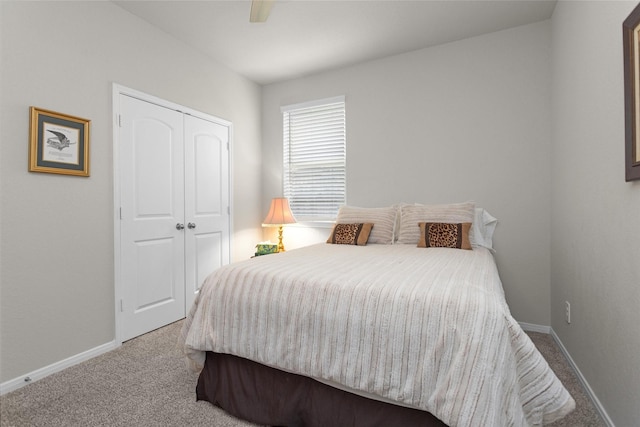1217 Antelope Passing Dr, Montgomery, TX 77316 - carpeted bedroom featuring baseboards, a closet, and a ceiling fan