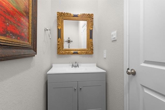 1217 Antelope Passing Dr, Montgomery, TX 77316 - bathroom featuring vanity and a textured wall