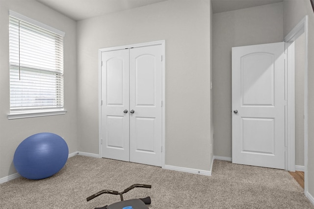 1217 Antelope Passing Dr, Montgomery, TX 77316 - workout area with carpet, healthy amount of natural light, and baseboards