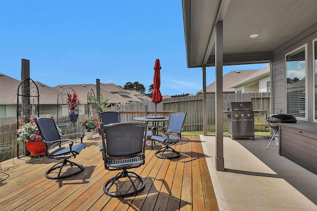 1217 Antelope Passing Dr, Montgomery, TX 77316 - deck with grilling area and outdoor dining area