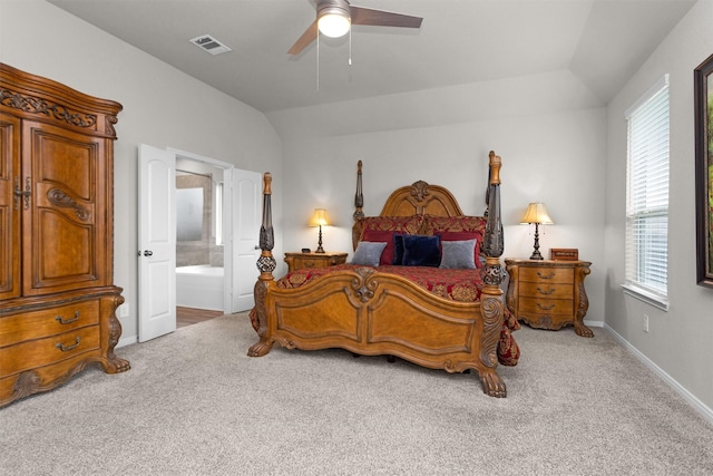 1217 Antelope Passing Dr, Montgomery, TX 77316 - bedroom with vaulted ceiling, carpet flooring, ensuite bathroom, and ceiling fan