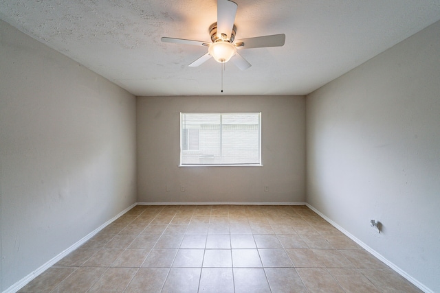 3614 Cheaney Dr, Houston, TX 77066 - spare room with ceiling fan, light tile patterned floors, and baseboards