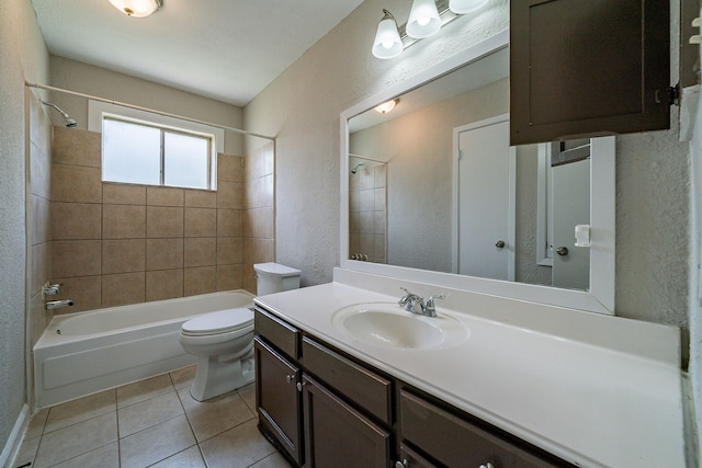3614 Cheaney Dr, Houston, TX 77066 - full bath featuring a textured wall,  shower combination, vanity, toilet, and tile patterned flooring