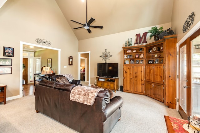 350 Pecan Estates Rd, Angleton, TX 77515 - living area featuring light colored carpet, high vaulted ceiling, ceiling fan, and baseboards