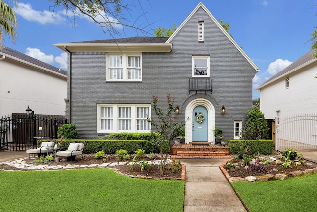 4019 Browning St, Houston, TX 77005 - view of front facade with a gate, brick siding, and an outdoor living space