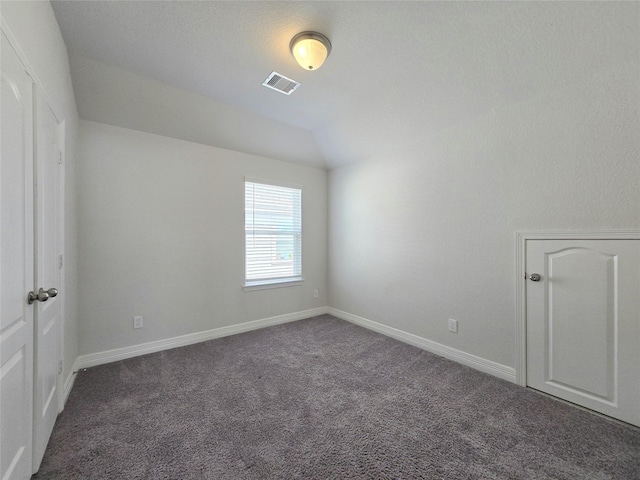 3559 Britton Burrow Way, Richmond, TX 77406 - empty room with carpet, baseboards, and vaulted ceiling