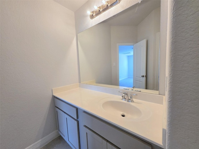 3559 Britton Burrow Way, Richmond, TX 77406 - bathroom featuring a textured wall and vanity