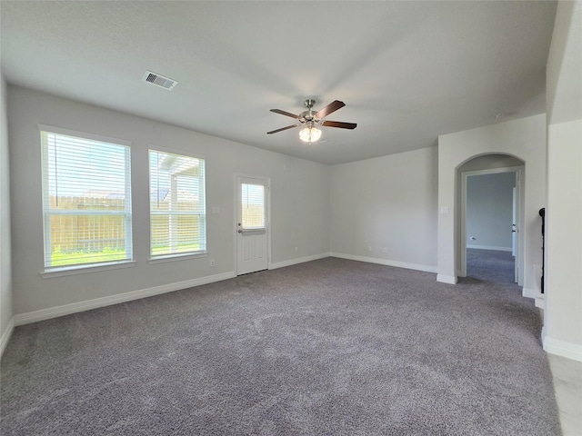 3559 Britton Burrow Way, Richmond, TX 77406 - carpeted spare room featuring ceiling fan, baseboards, and arched walkways