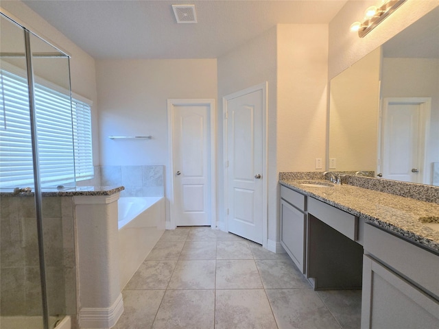 3559 Britton Burrow Way, Richmond, TX 77406 - full bath featuring double vanity, a garden tub, tile patterned floors, and a shower with shower door