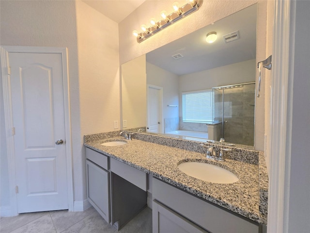 3559 Britton Burrow Way, Richmond, TX 77406 - full bathroom with double vanity, a bath, a stall shower, and tile patterned flooring