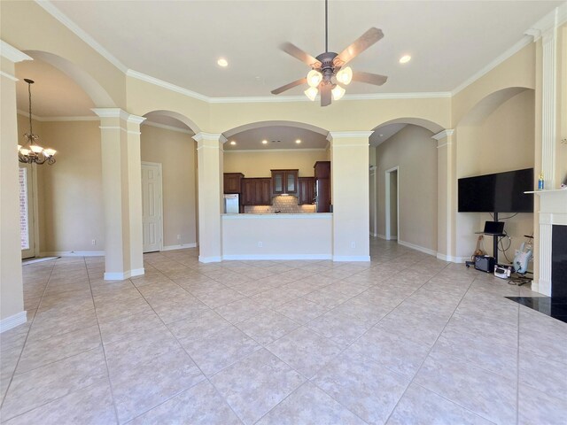 12515 Stoney Creek Dr, Pearland, TX 77584 - unfurnished living room with ceiling fan, decorative columns, crown molding, recessed lighting, and light tile patterned floors