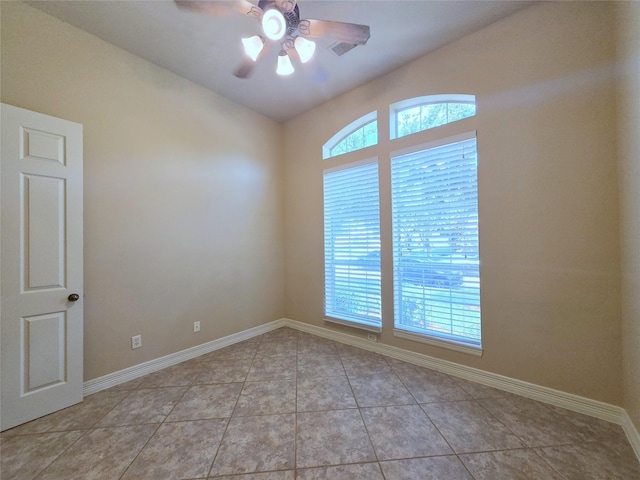 12515 Stoney Creek Dr, Pearland, TX 77584 - unfurnished room with plenty of natural light, a ceiling fan, light tile patterned floors, baseboards, and lofted ceiling
