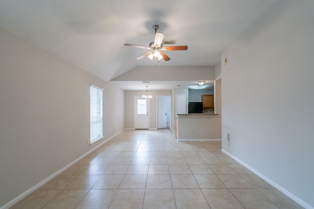 6635 Rusty Ridge Ln, Katy, TX 77449 - unfurnished living room with ceiling fan, light tile patterned flooring, lofted ceiling, and baseboards