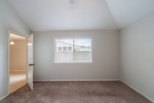 6635 Rusty Ridge Ln, Katy, TX 77449 - empty room with lofted ceiling, carpet, and baseboards