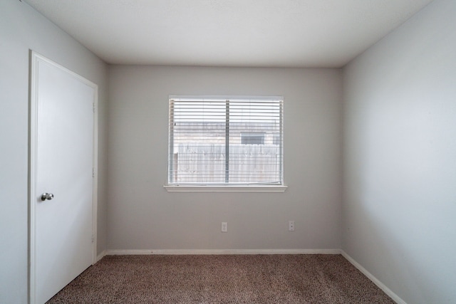 6635 Rusty Ridge Ln, Katy, TX 77449 - empty room featuring carpet floors and baseboards