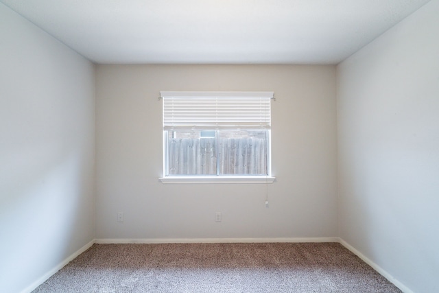 6635 Rusty Ridge Ln, Katy, TX 77449 - empty room featuring carpet and baseboards