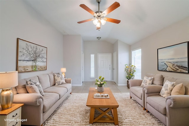 6635 Rusty Ridge Ln, Katy, TX 77449 - living room with vaulted ceiling, a ceiling fan, light tile patterned flooring, and baseboards