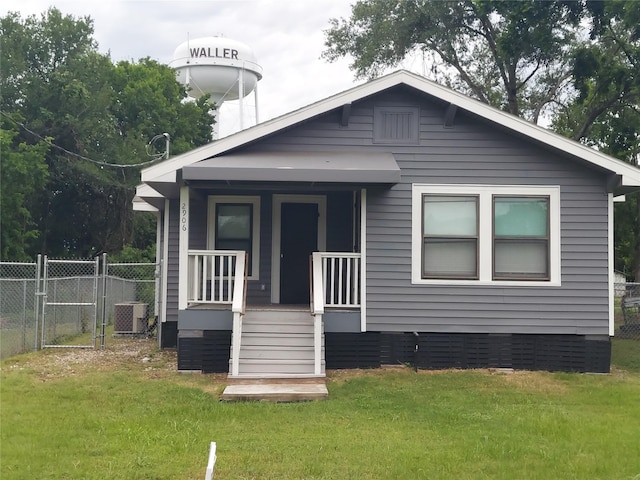 2906 Sledge St, Waller, TX 77484 - view of front of property featuring covered porch and a gate