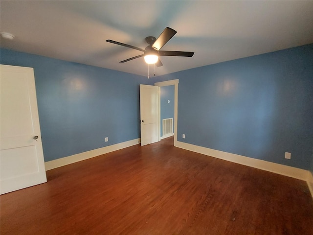 2906 Sledge St, Waller, TX 77484 - unfurnished room with dark wood finished floors, ceiling fan, baseboards, and a smoke detector