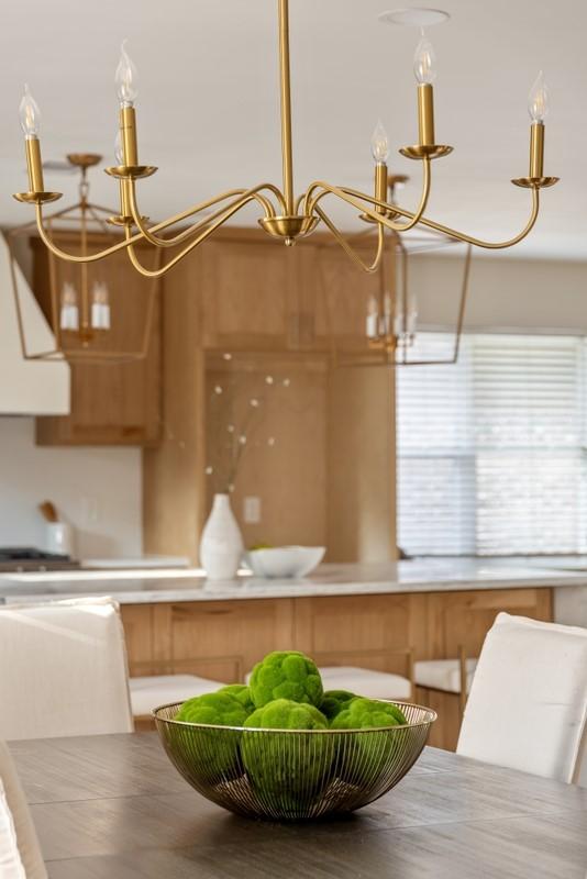2906 Riata Ln, Houston, TX 77043 - dining area with a chandelier