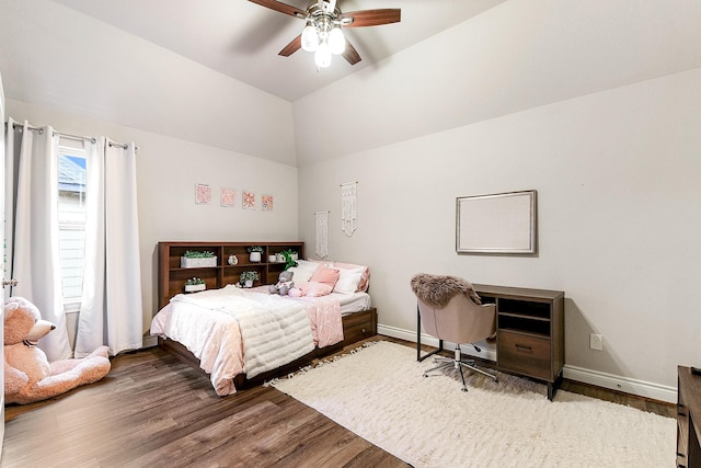 29306 Lovegrass Ct, Katy, TX 77494 - bedroom featuring wood finished floors, baseboards, vaulted ceiling, and a ceiling fan