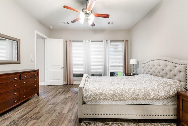 29306 Lovegrass Ct, Katy, TX 77494 - bedroom featuring wood finished floors and a ceiling fan