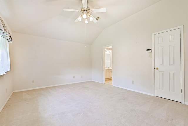 4934 Parkcrest Dr, La Porte, TX 77571 - empty room featuring a ceiling fan, vaulted ceiling, light carpet, and baseboards