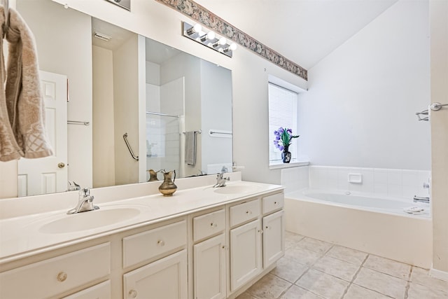 4934 Parkcrest Dr, La Porte, TX 77571 - full bath featuring double vanity, a bath, a shower with door, tile patterned floors, and lofted ceiling