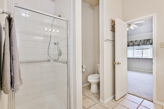 4934 Parkcrest Dr, La Porte, TX 77571 - full bath with toilet, a shower stall, tile patterned flooring, and a ceiling fan