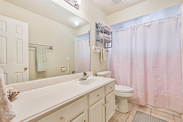 4934 Parkcrest Dr, La Porte, TX 77571 - full bathroom with toilet, tile patterned floors, vanity, and curtained shower