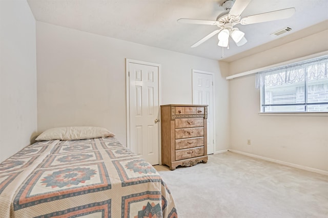 4934 Parkcrest Dr, La Porte, TX 77571 - bedroom featuring light colored carpet, ceiling fan, and baseboards