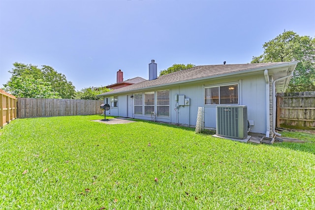4934 Parkcrest Dr, La Porte, TX 77571 - rear view of property with a chimney and cooling unit