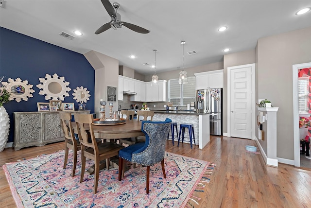 2706 Eado Edge Ct, Houston, TX 77020 - dining space featuring ceiling fan, light wood-style floors, vaulted ceiling, recessed lighting, and baseboards