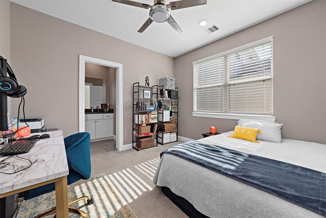 2706 Eado Edge Ct, Houston, TX 77020 - bedroom with light colored carpet, connected bathroom, and baseboards