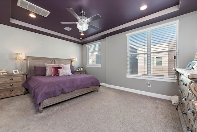 2706 Eado Edge Ct, Houston, TX 77020 - bedroom with a raised ceiling, carpet floors, baseboards, a ceiling fan, and recessed lighting